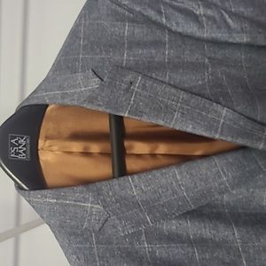 Awesome Grey stripped blazer with brown inseam.